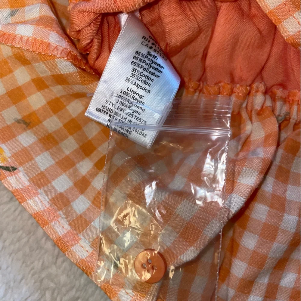 Greylin Orange Smocked Peplum Crop Top with Yellow Flower Pattern Detail - Picture 5 of 6